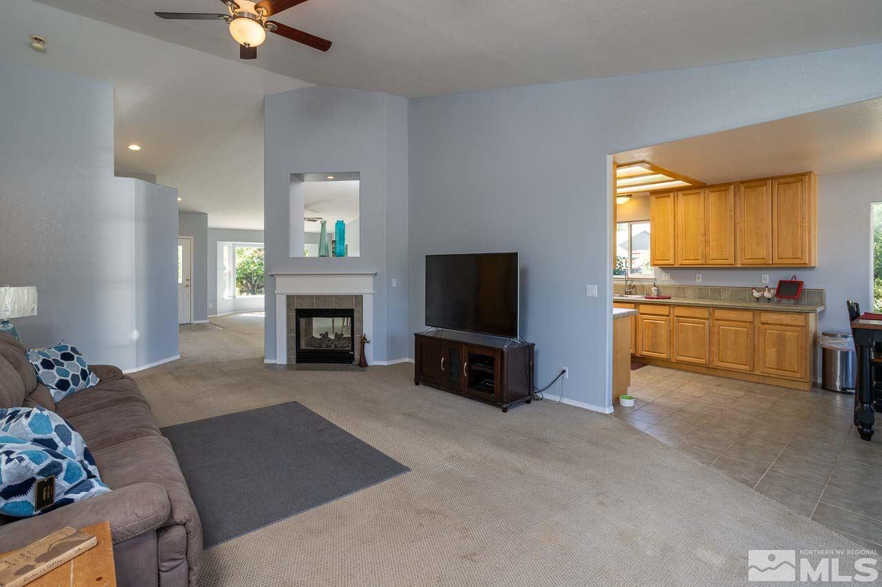 2139 Inca Dove Court Sparks, NV 89441 - Photo 8 of 25 a living room with furniture and a fireplace