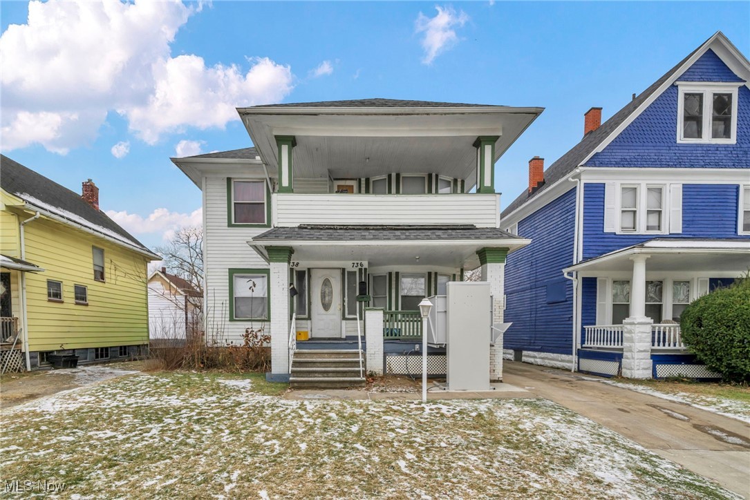 738 Eddy Road Cleveland, OH 44108 - Photo 2 of 33 View of front of house featuring covered porch and a balcony