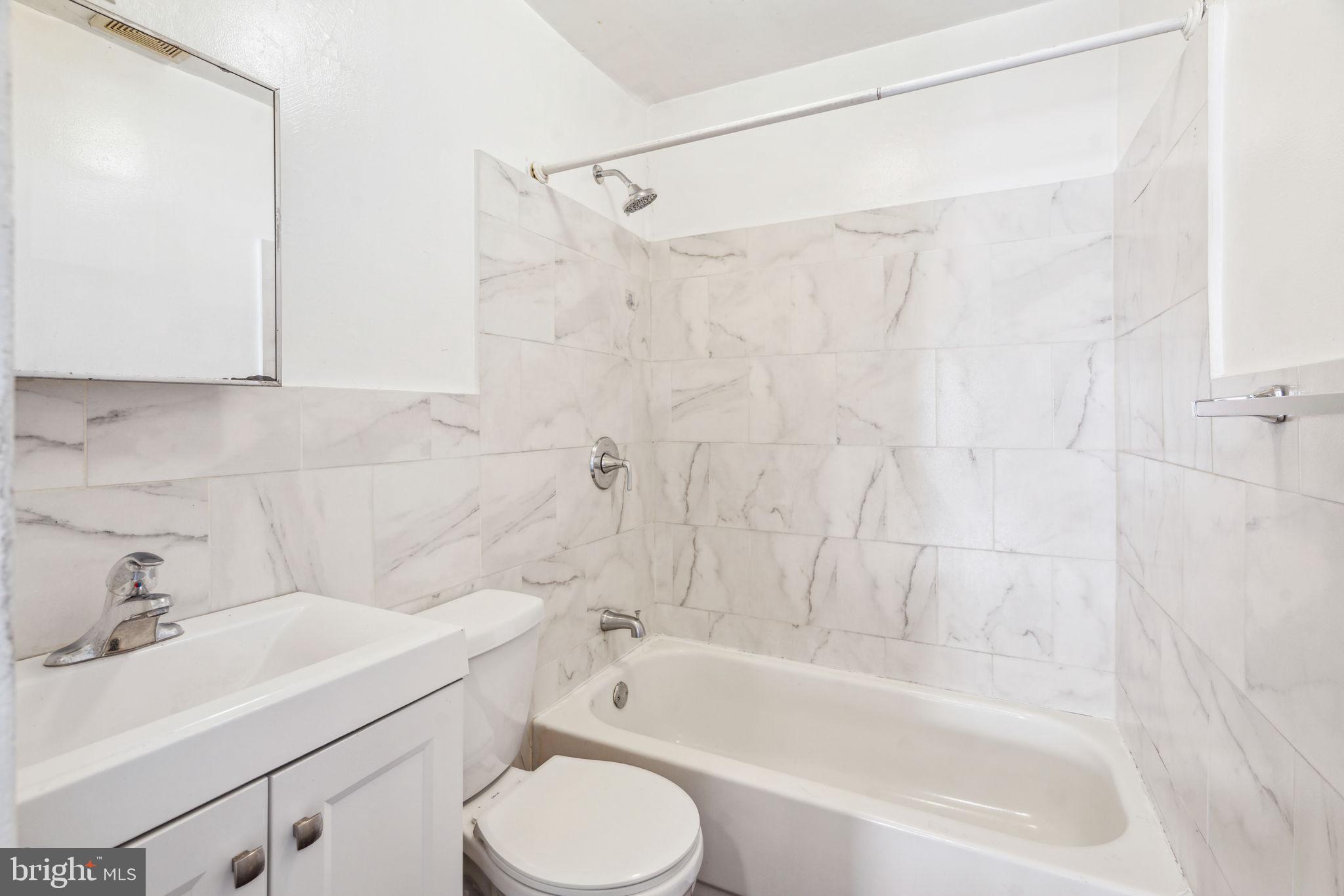101 Pleasant Street Philadelphia, PA 19119 - Photo 15 of 43 a bathroom with a sink a toilet and a bathtub