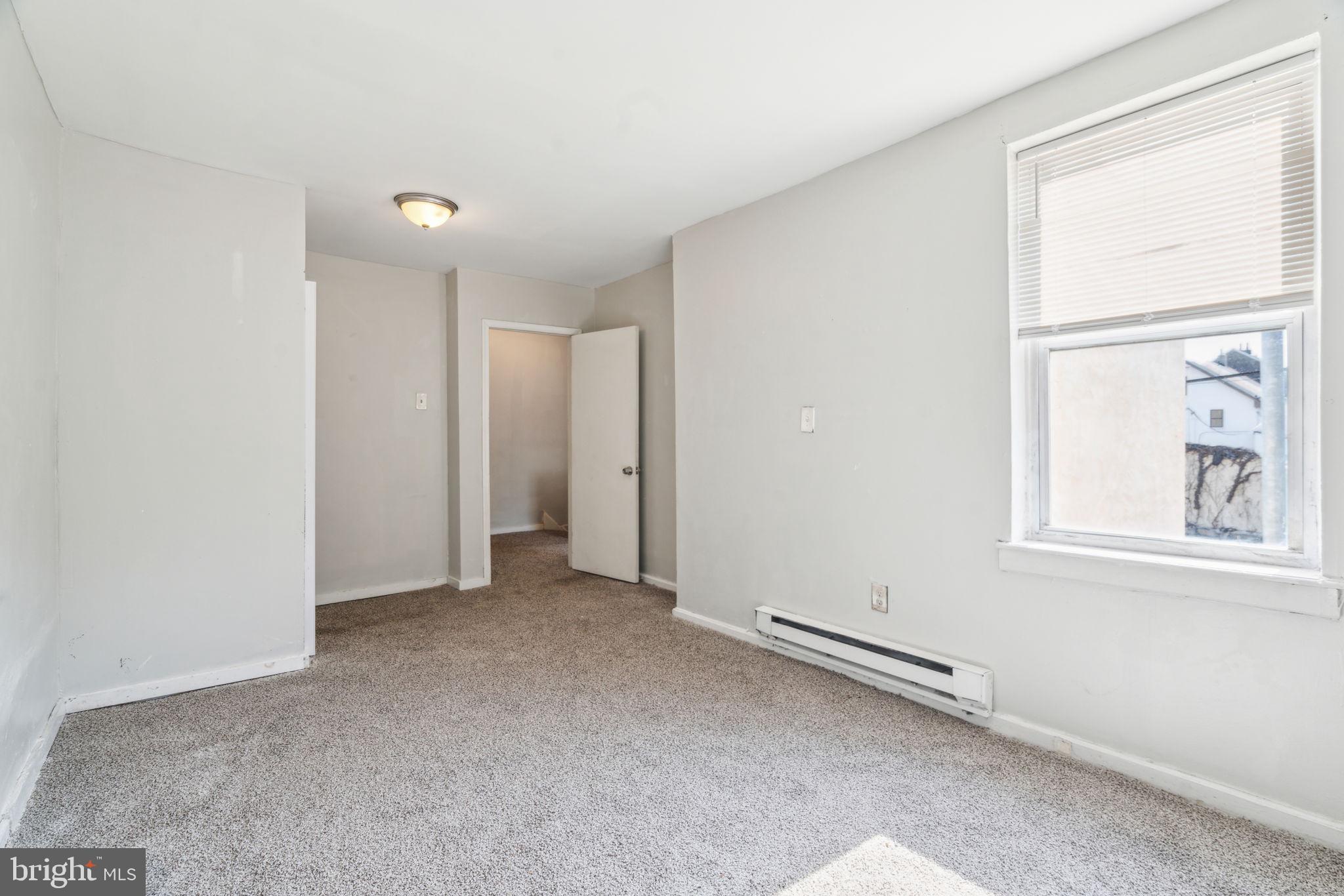 101 Pleasant Street Philadelphia, PA 19119 - Photo 19 of 43 an empty room with windows