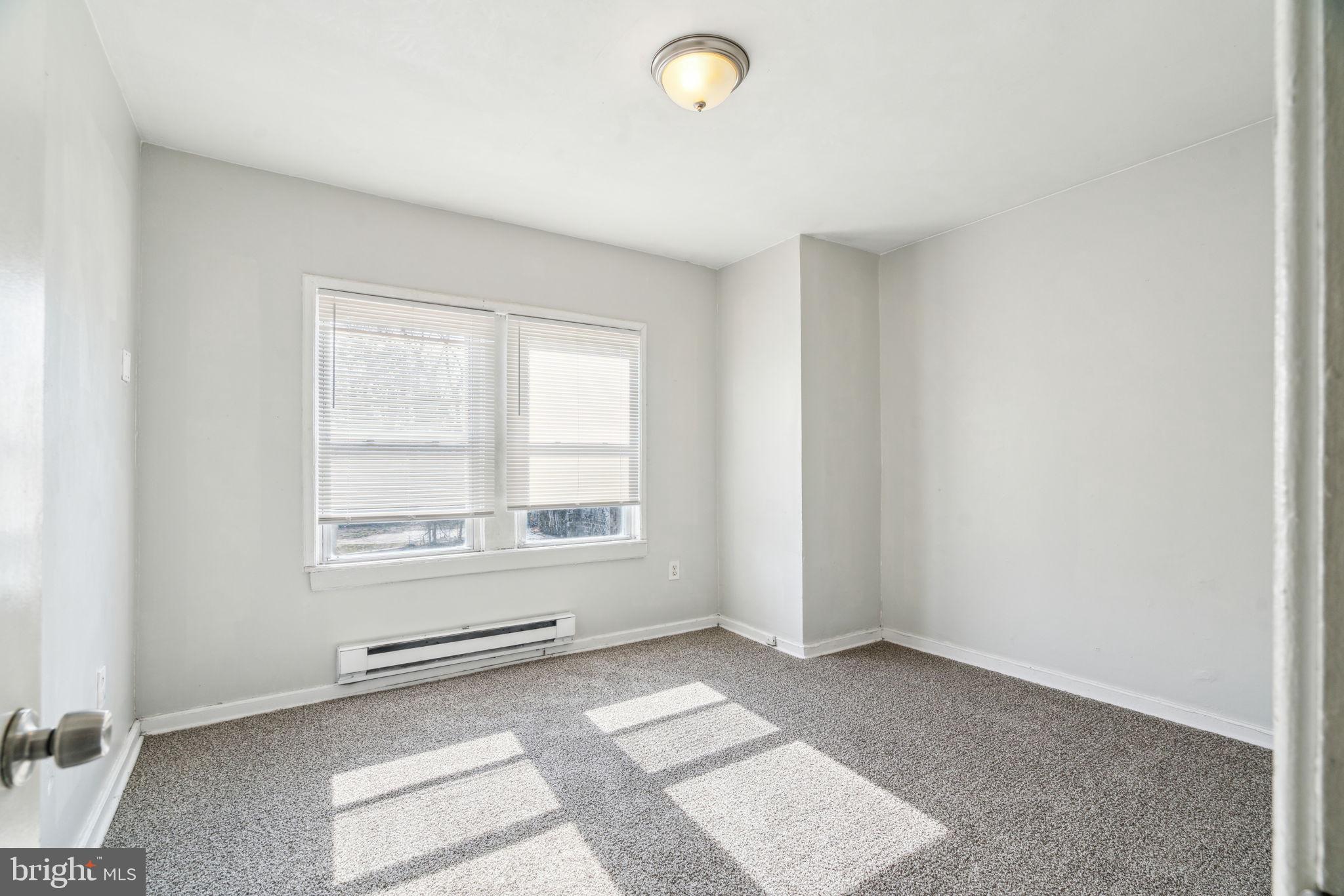 101 Pleasant Street Philadelphia, PA 19119 - Photo 24 of 43 an empty room with windows
