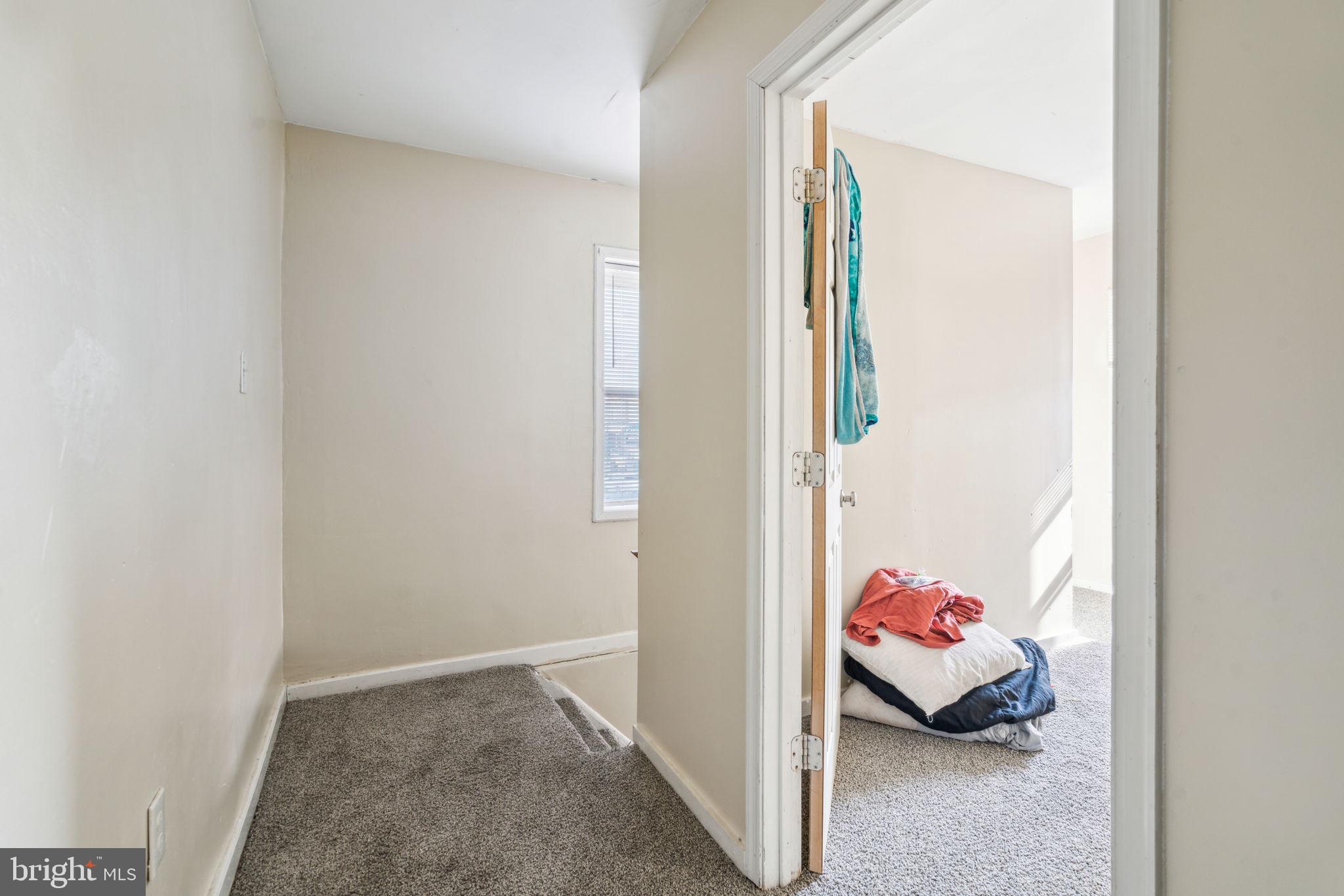 101 Pleasant Street Philadelphia, PA 19119 - Photo 35 of 43 a bedroom with a bed and a window
