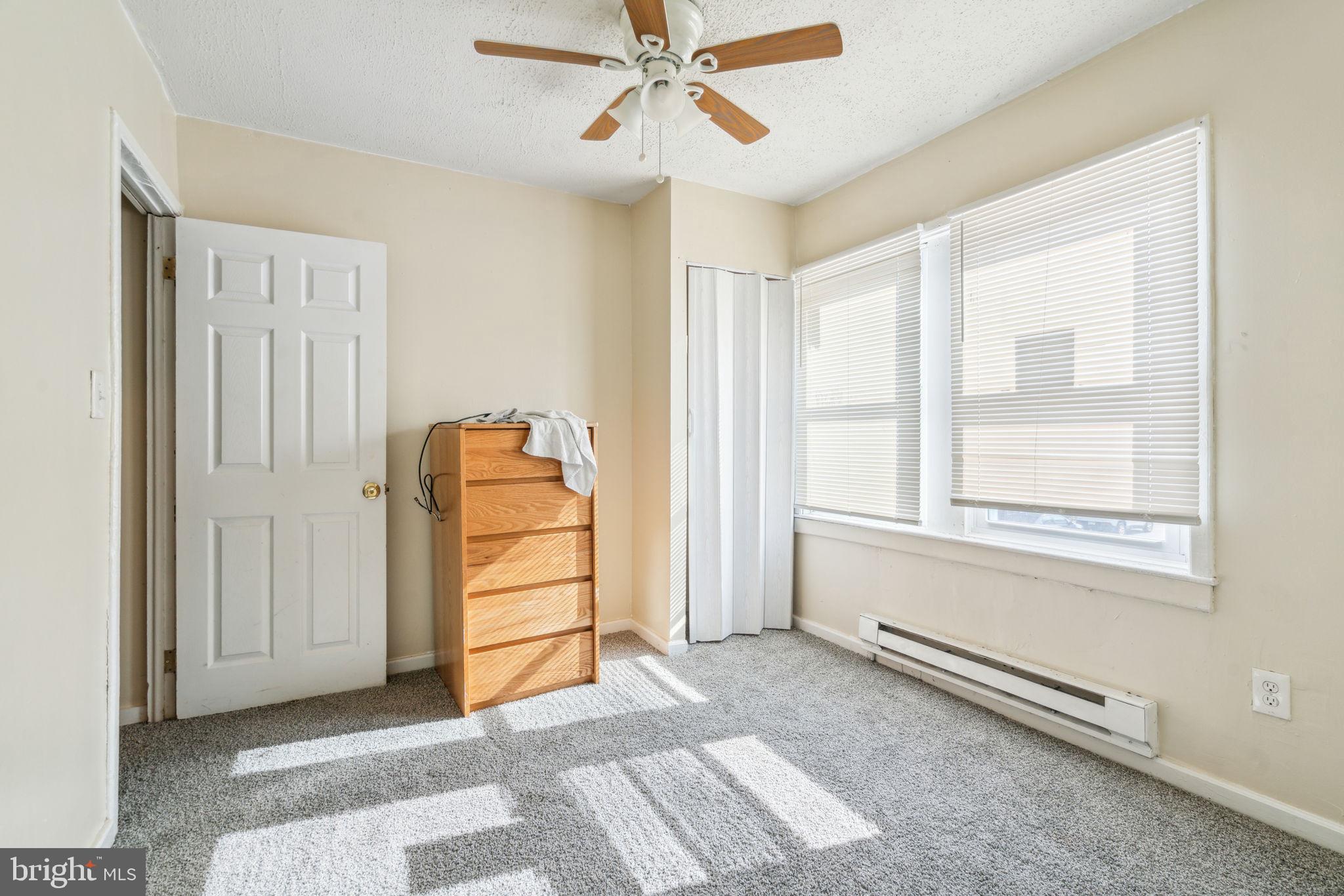 101 Pleasant Street Philadelphia, PA 19119 - Photo 38 of 43 a view of room with stairs and a ceiling fan