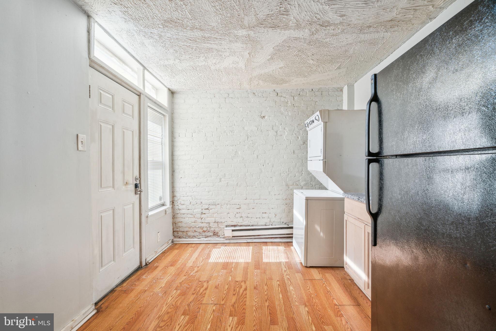 101 Pleasant Street Philadelphia, PA 19119 - Photo 4 of 43 a view of empty room with wooden floor and fan