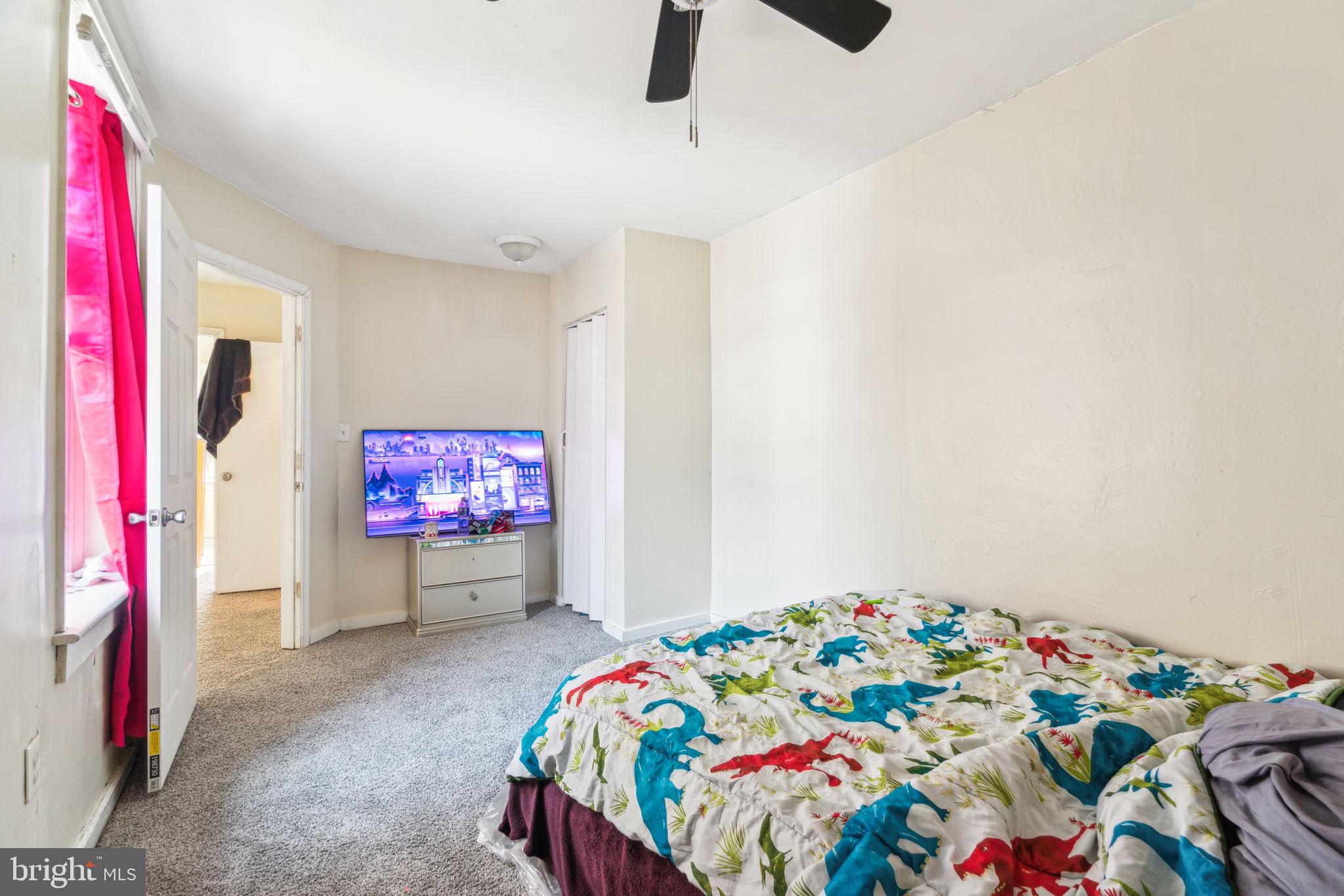 101 Pleasant Street Philadelphia, PA 19119 - Photo 42 of 43 a bedroom with furniture and a flat screen tv
