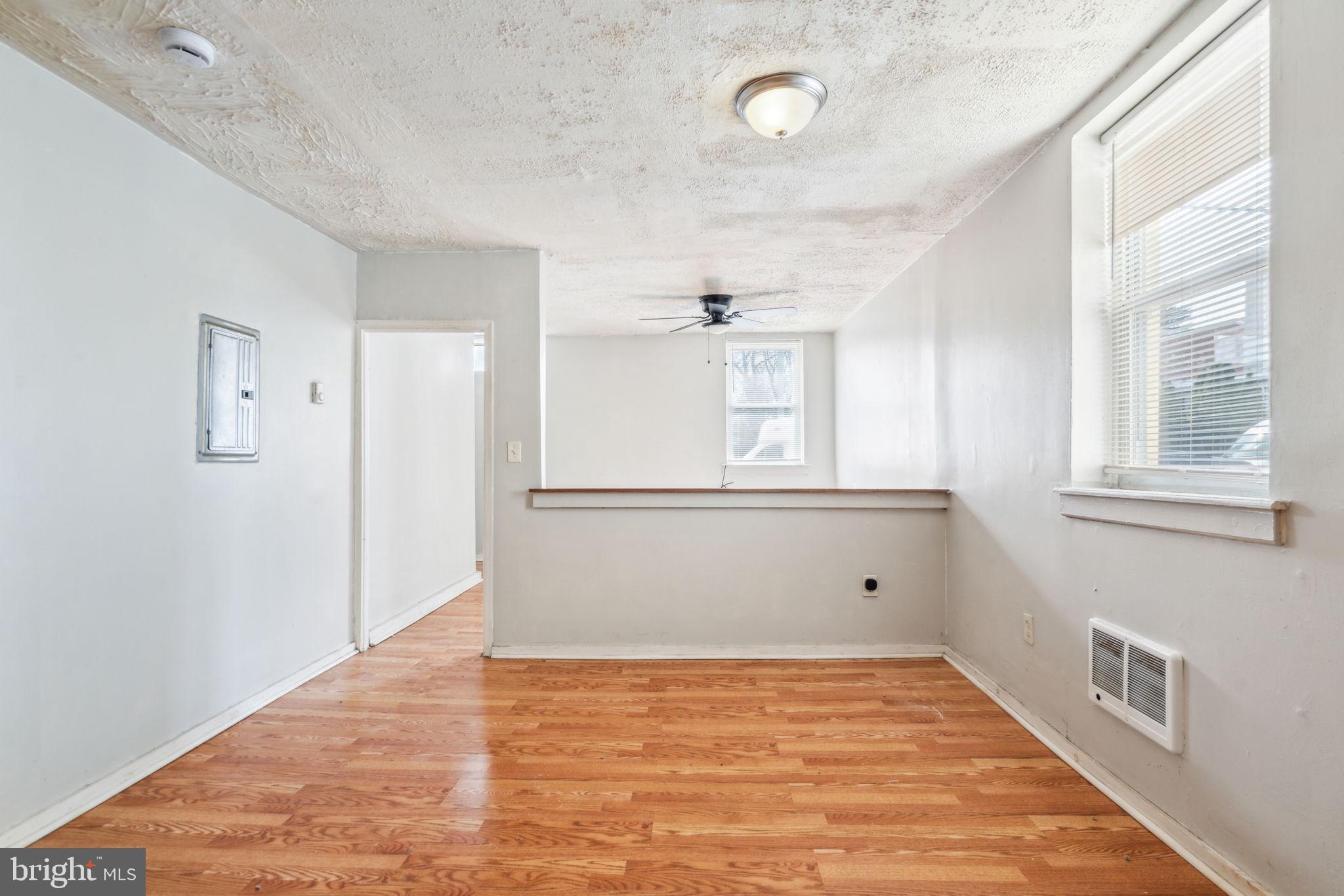 101 Pleasant Street Philadelphia, PA 19119 - Photo 7 of 43 a view of empty room with wooden floor and fan