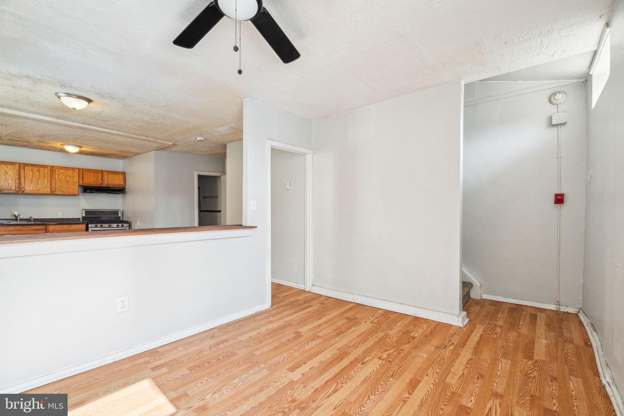 101 Pleasant Street Philadelphia, PA 19119 - Photo 10 of 43 a view of an empty room with kitchen and a window