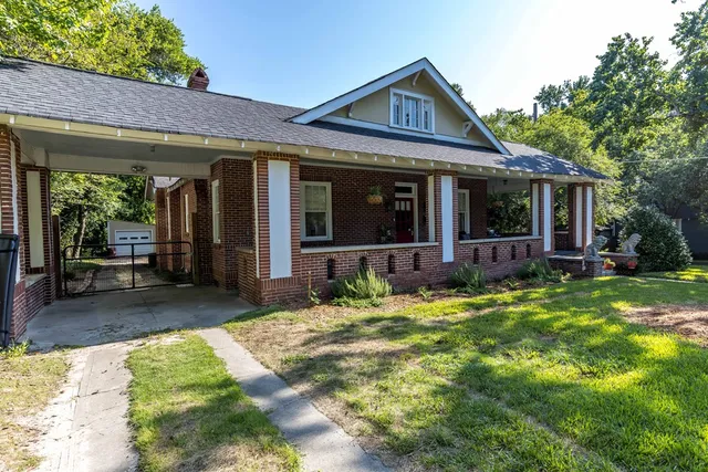 a view of a house with garden