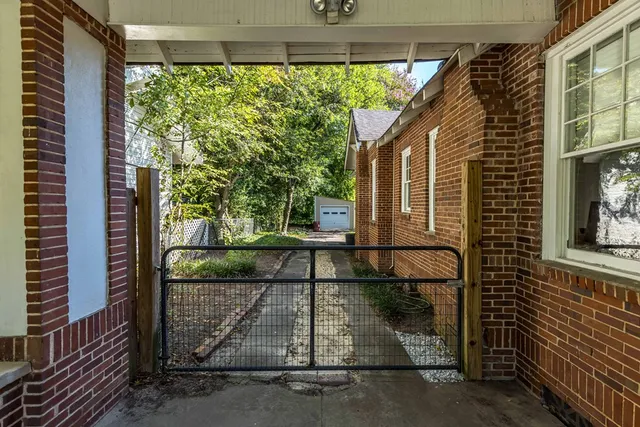 a view of a house with a street