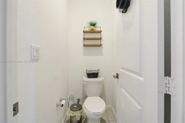 a bathroom with a toilet and a sink