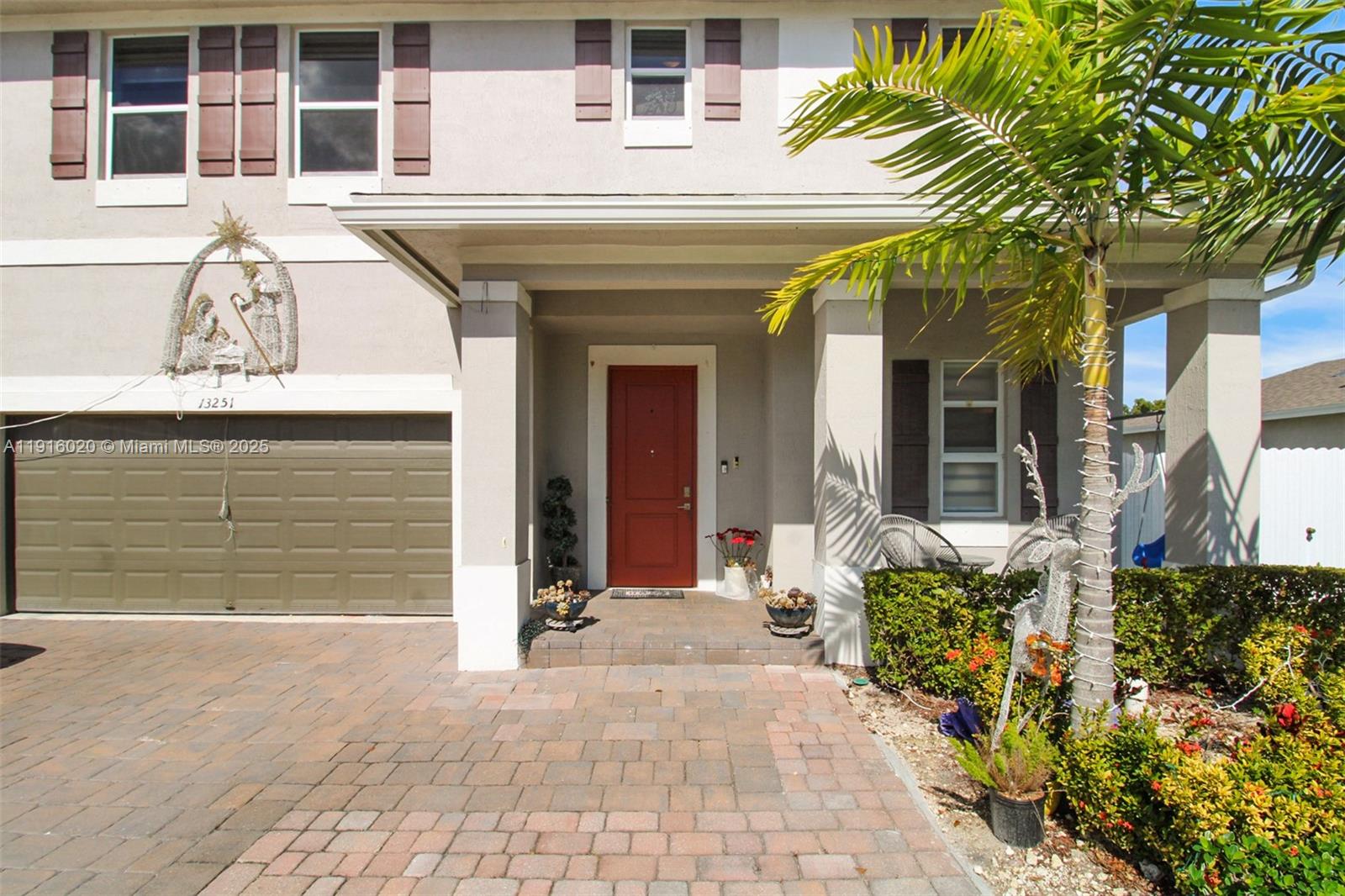 13251 Southwest 274th Terrace Homestead, FL 33032 - Photo 2 of 36 a view of a house with outdoor space