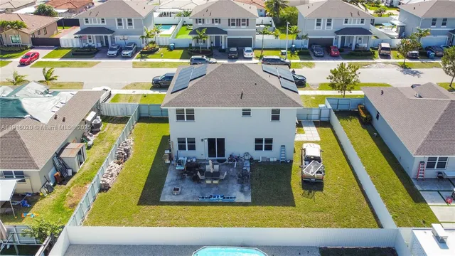 a view of swimming pool with outdoor seating