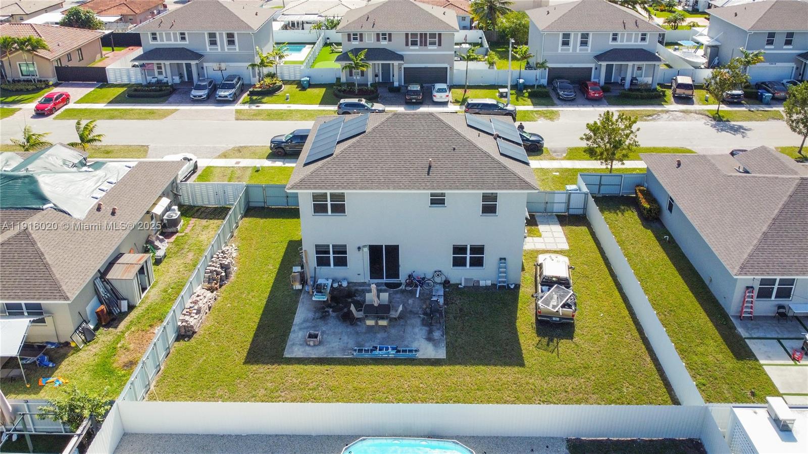 13251 Southwest 274th Terrace Homestead, FL 33032 - Photo 28 of 36 a view of swimming pool with outdoor seating