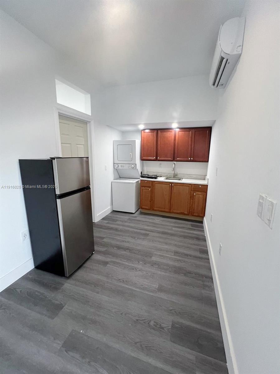 13251 Southwest 274th Terrace Homestead, FL 33032 - Photo 32 of 36 a view of kitchen and wooden floor