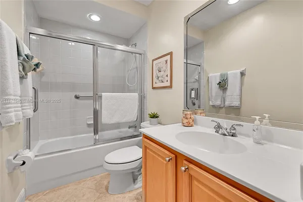 a view of a garden with a building in the background