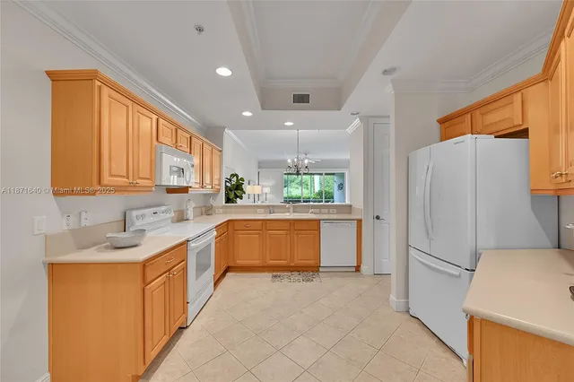 a living room with furniture tv and a large window