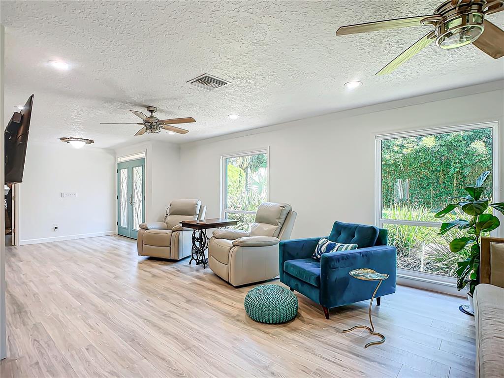 544 Stone Island Road Deltona, FL 32725 - Photo 11 of 66 Great room-FAB windows