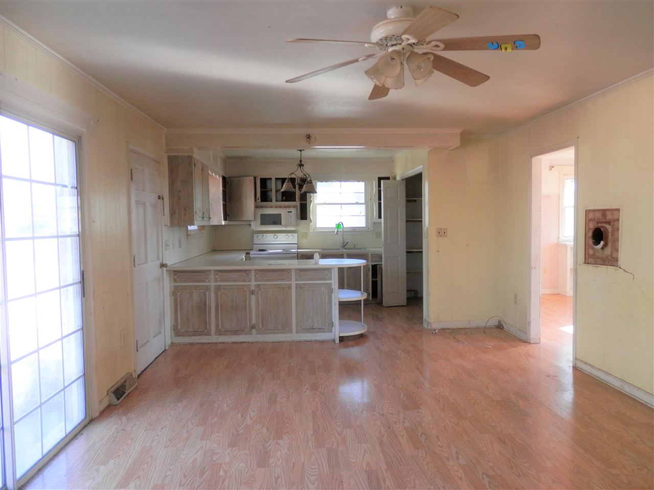 2024 Knightly Mill Road Fort Defiance, VA 24437 - Photo 8 of 26 a kitchen with stainless steel appliances a sink cabinets and wooden floor