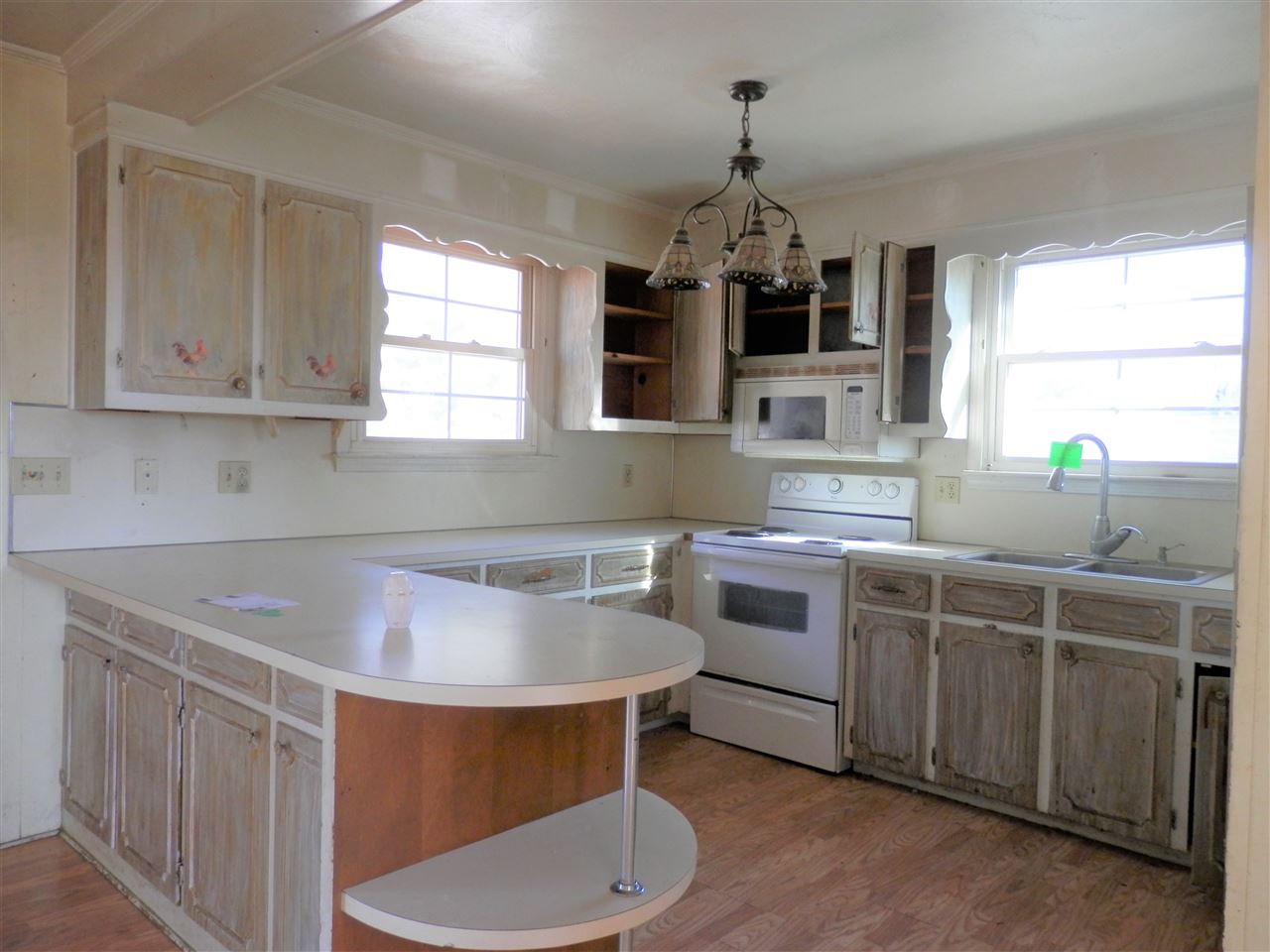 2024 Knightly Mill Road Fort Defiance, VA 24437 - Photo 9 of 26 a kitchen that has a sink and a stove in it