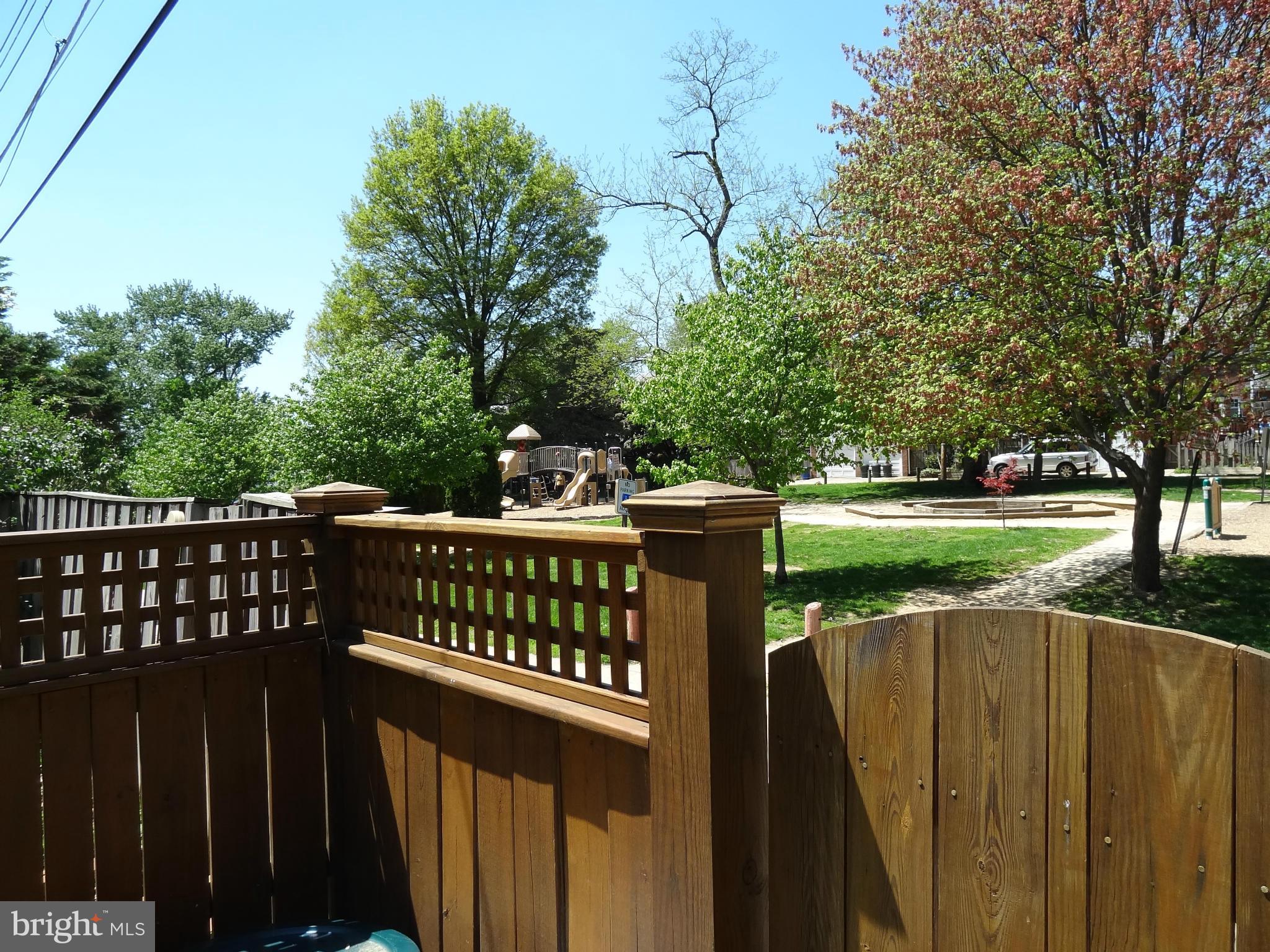 234 Blenheim Road Baltimore, MD 21212 - Photo 16 of 16 a view of a deck with a wooden fence
