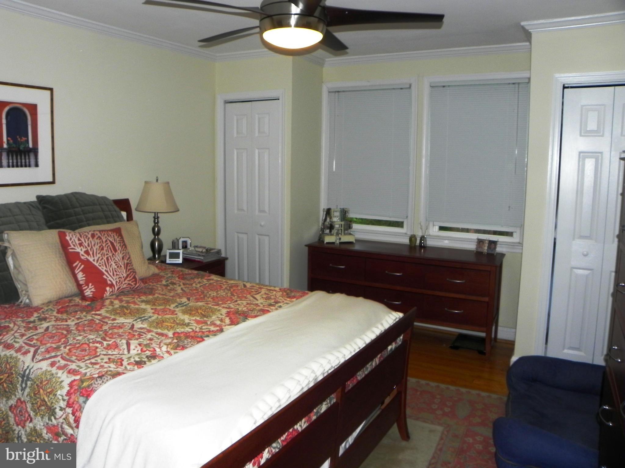234 Blenheim Road Baltimore, MD 21212 - Photo 9 of 16 a bedroom with a bed and a dresser