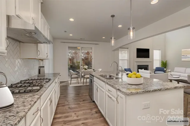 a room with furniture and a chandelier