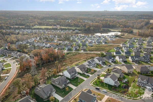 an aerial view of residential building with parking space