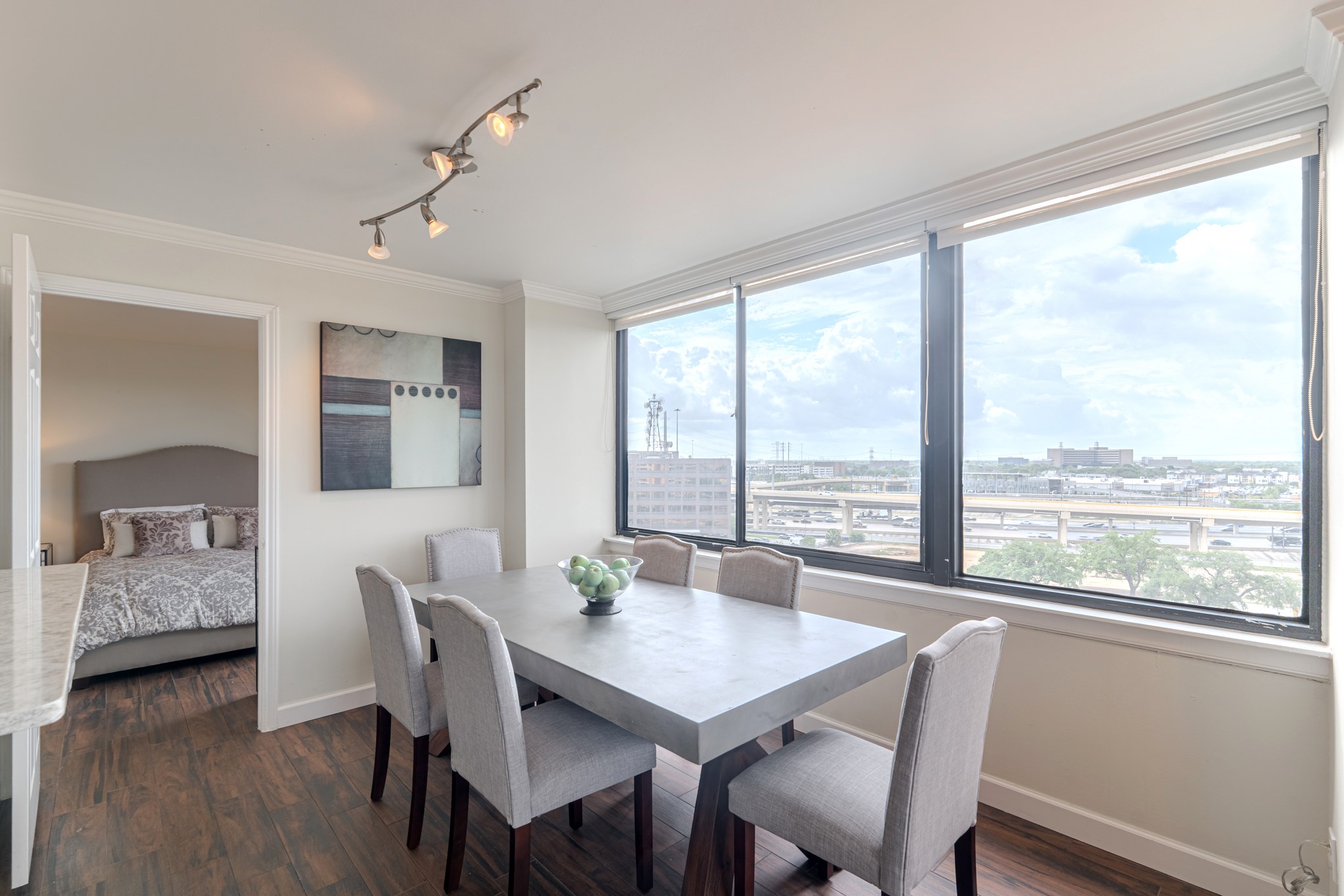 3525 Sage Road, Unit 1016 Houston, TX 77056 - Photo 25 of 42 a view of a dining room with furniture and window