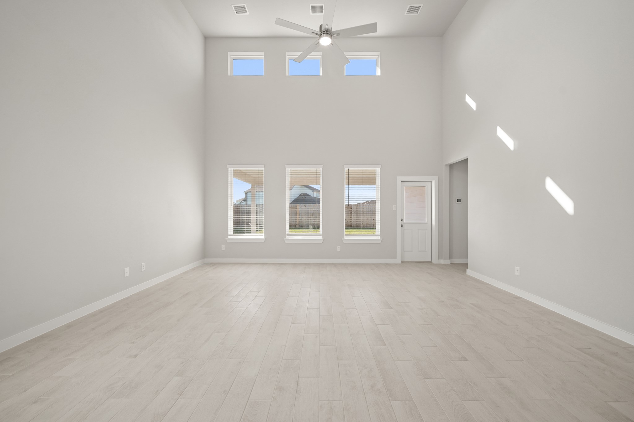 643 Yard Master Trail Rosharon, TX 77583 - Photo 8 of 39 a view of an empty room with chandelier fan