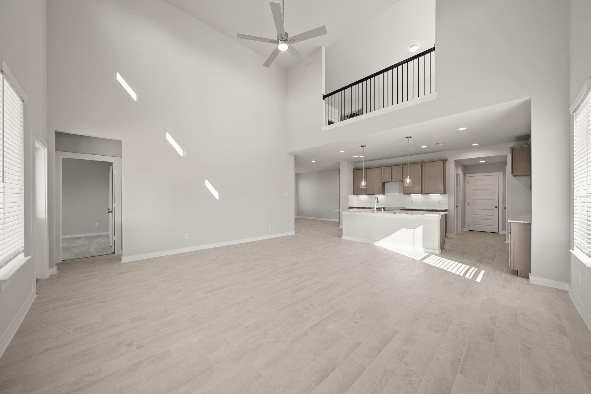643 Yard Master Trail Rosharon, TX 77583 - Photo 9 of 39 a view of a kitchen with refrigerator and windows