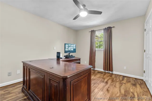 a kitchen with a stove a sink and a refrigerator
