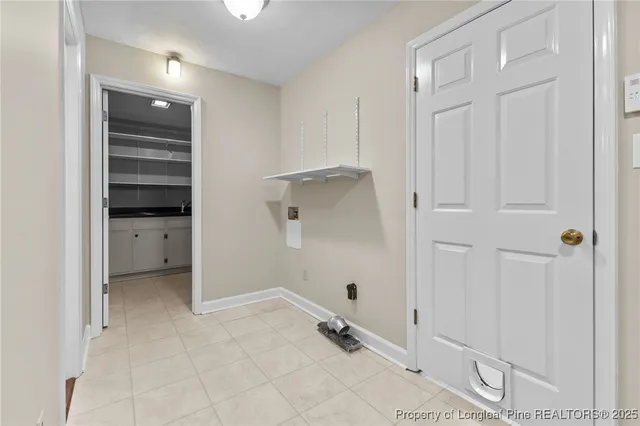 a close view of closet with wooden floor