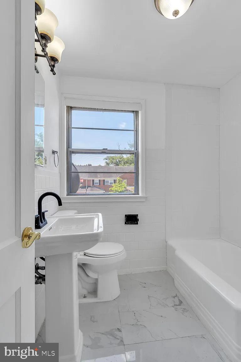 1804 Winford Road Baltimore, MD 21239 - Photo 9 of 17 Bright and airy modern bathroom retreat.