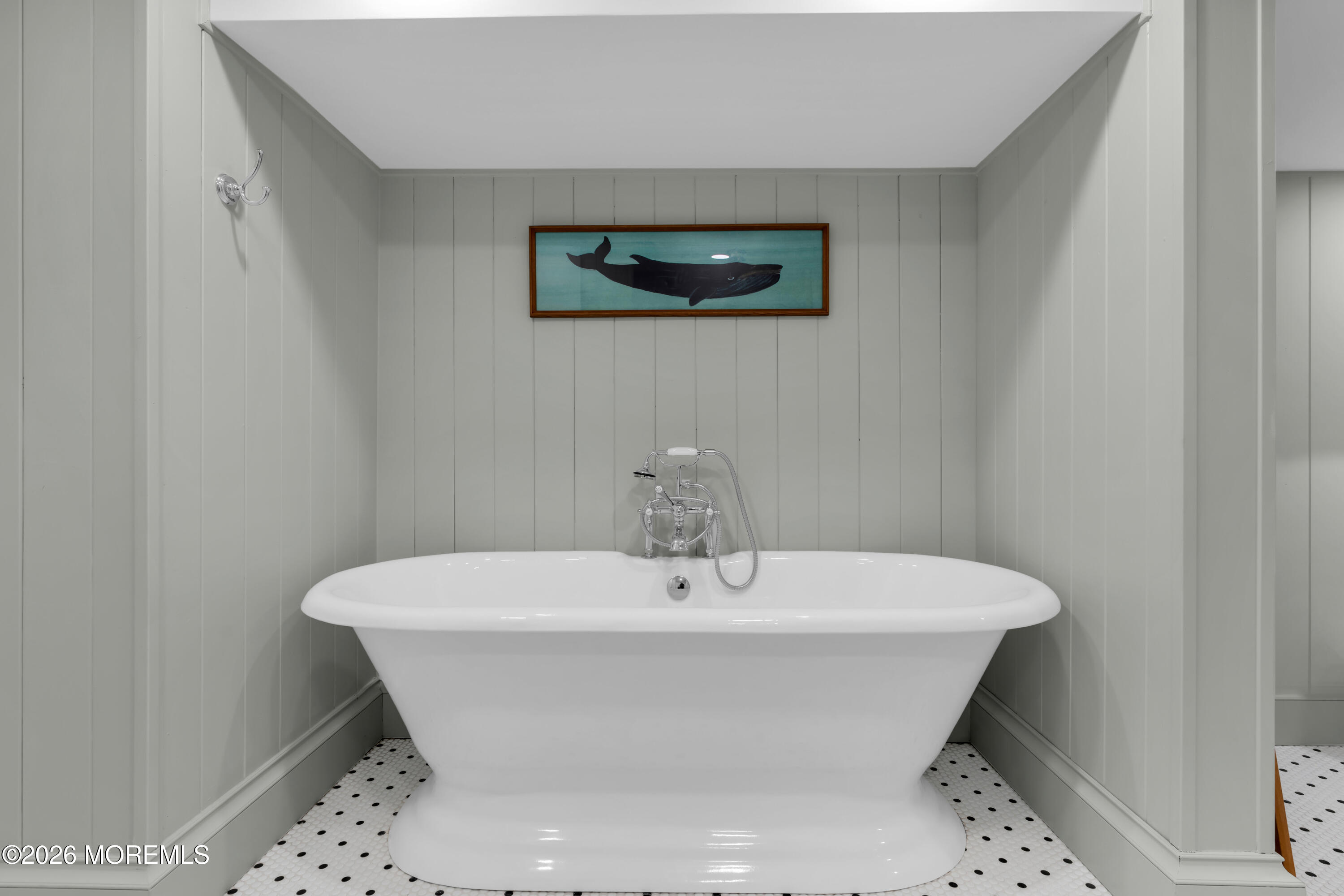 117 Madison Avenue Spring Lake, NJ 07762 - Photo 13 of 96 a white bath tub sitting in a bathroom