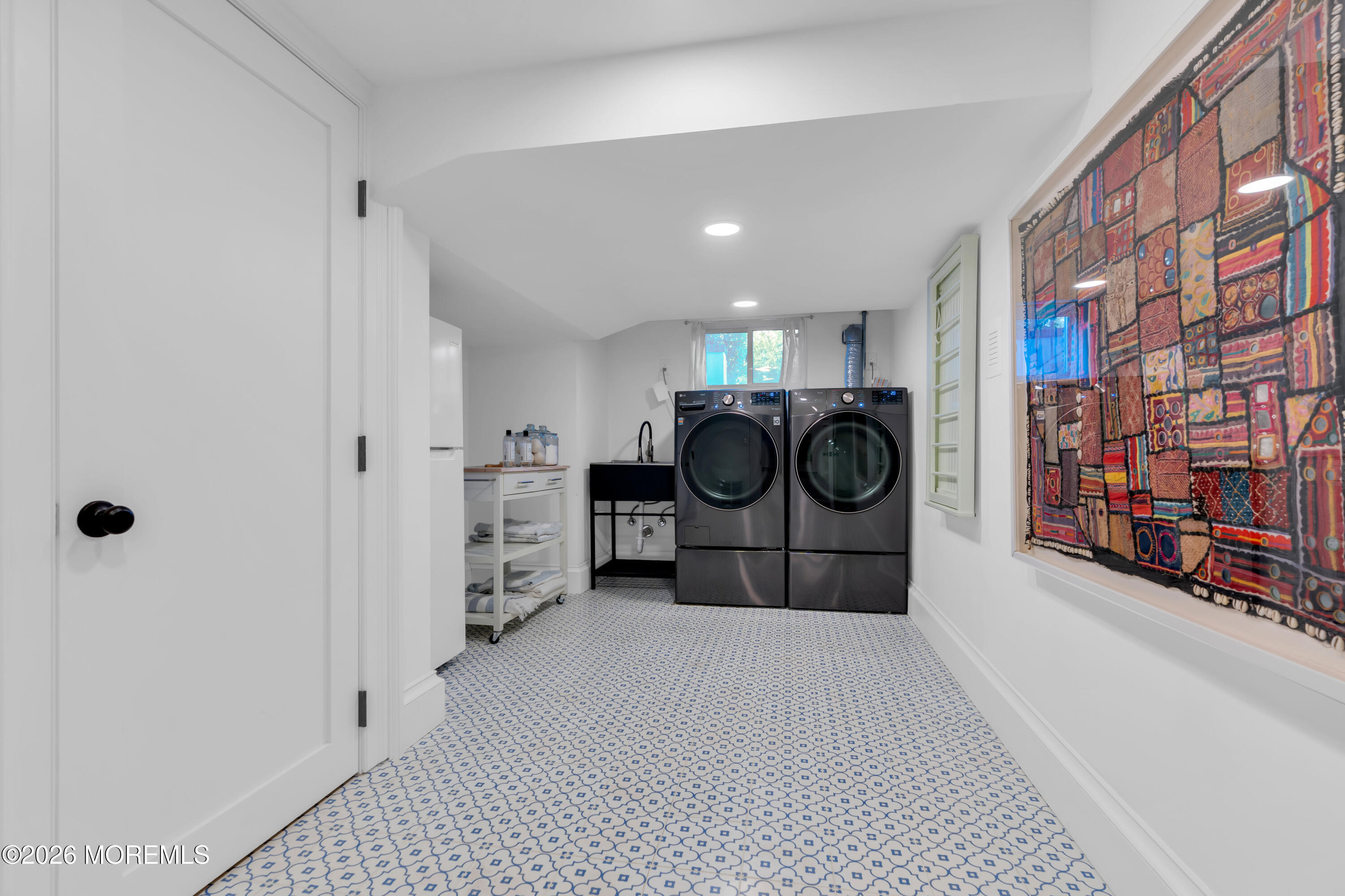 117 Madison Avenue Spring Lake, NJ 07762 - Photo 14 of 96 a view of walk in closet with clothes and shoes