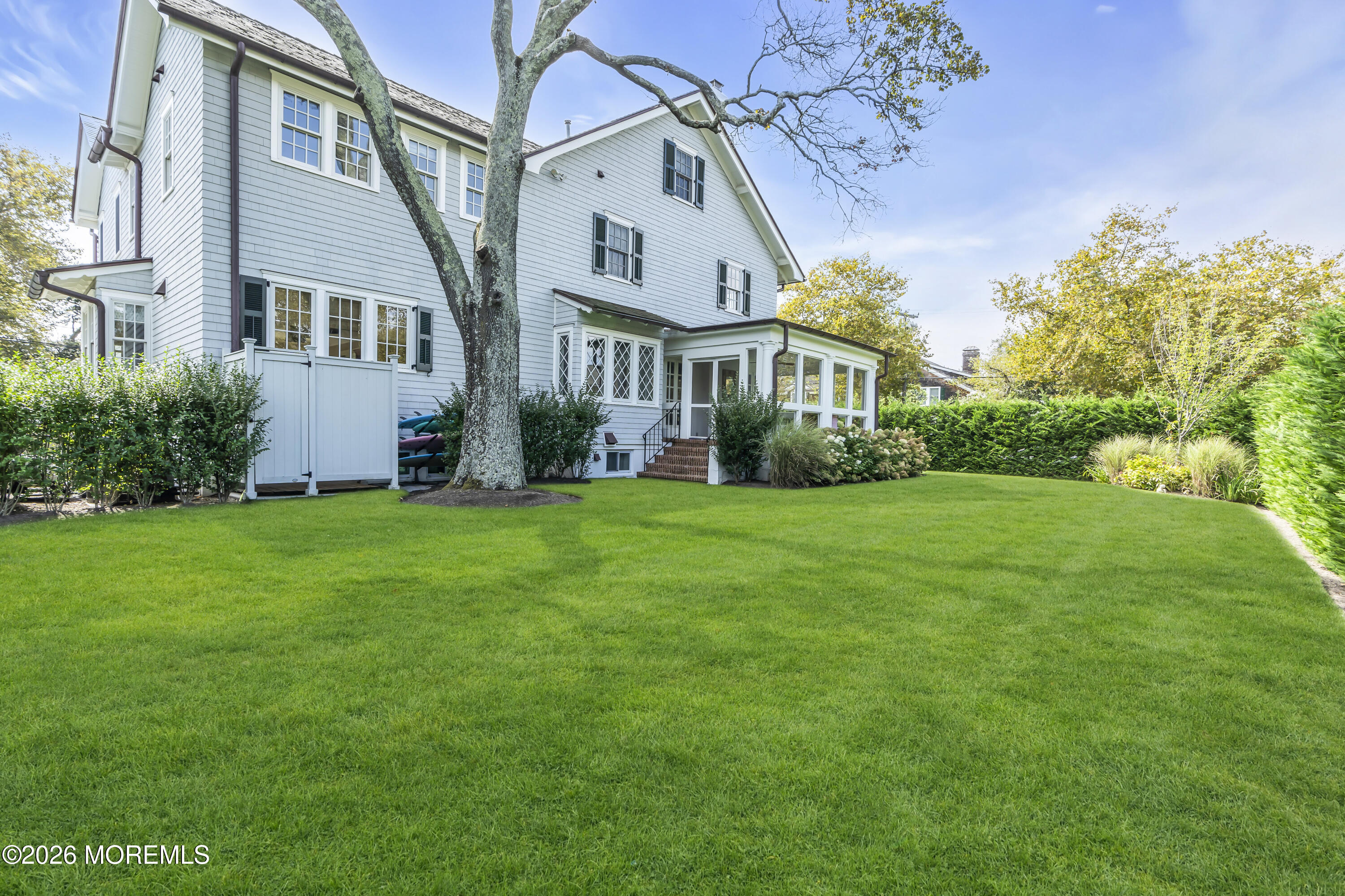 117 Madison Avenue Spring Lake, NJ 07762 - Photo 23 of 96 a view of a front of a house with a garden
