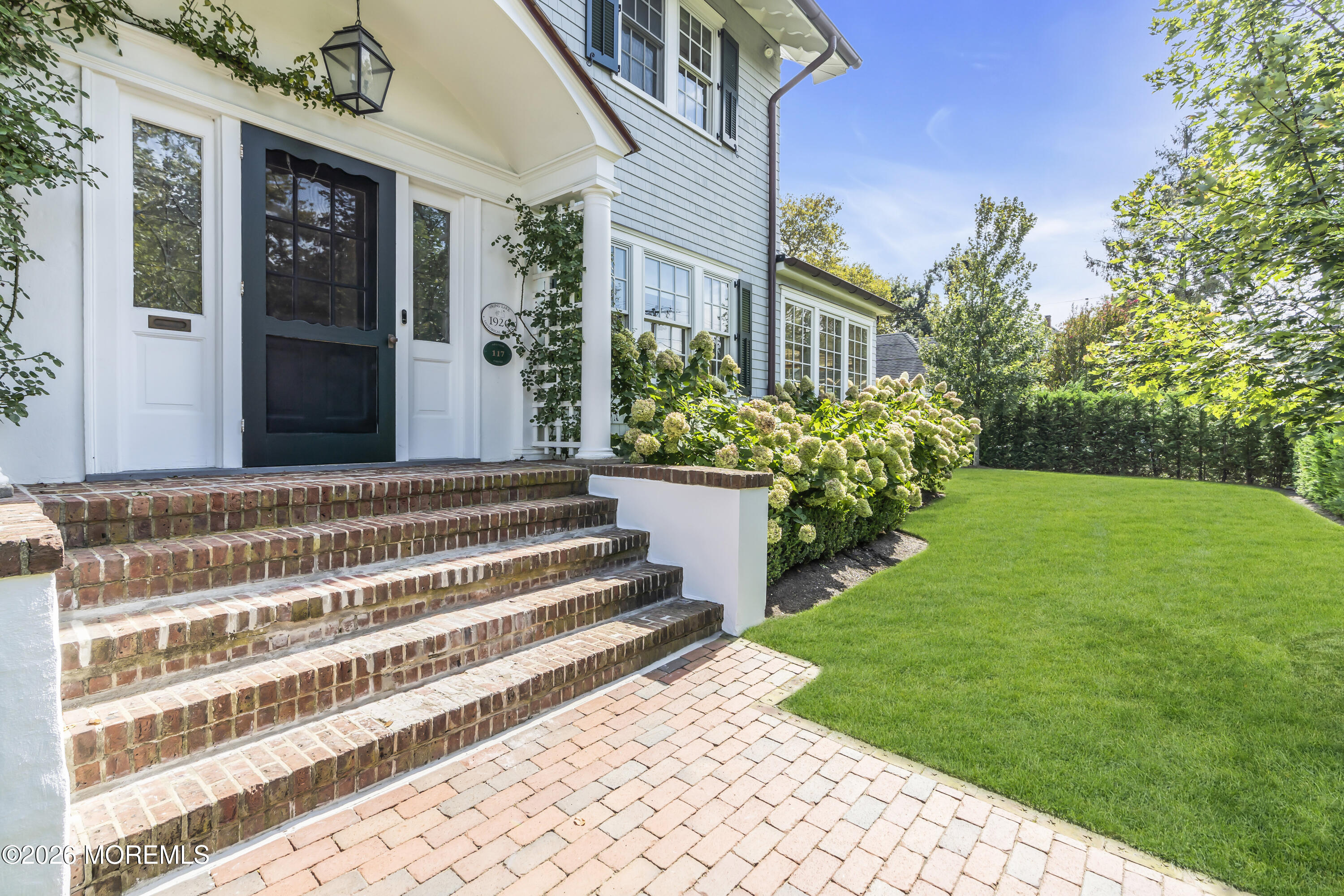 117 Madison Avenue Spring Lake, NJ 07762 - Photo 41 of 96 a view of a house with a yard