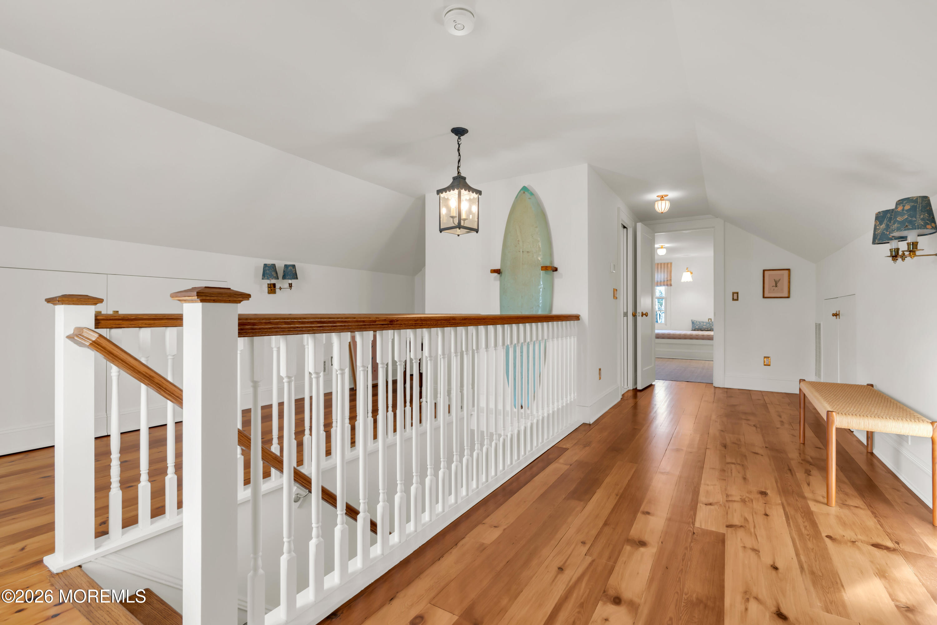 117 Madison Avenue Spring Lake, NJ 07762 - Photo 50 of 96 a view of a hallway with wooden floor and staircase
