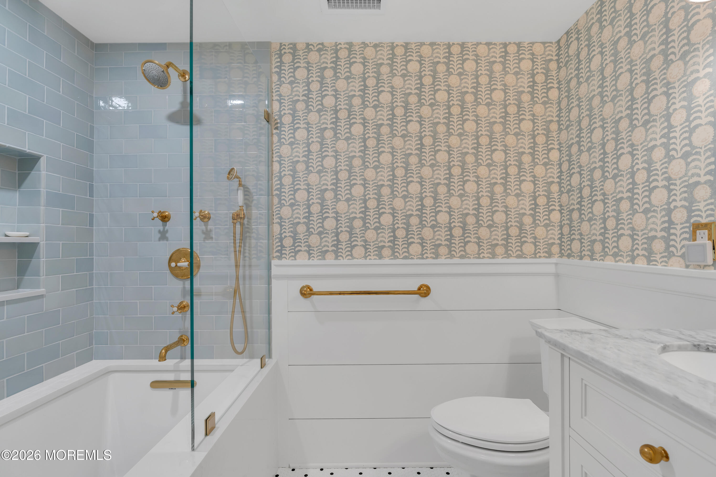 117 Madison Avenue Spring Lake, NJ 07762 - Photo 53 of 96 a bathroom with a toilet and shower