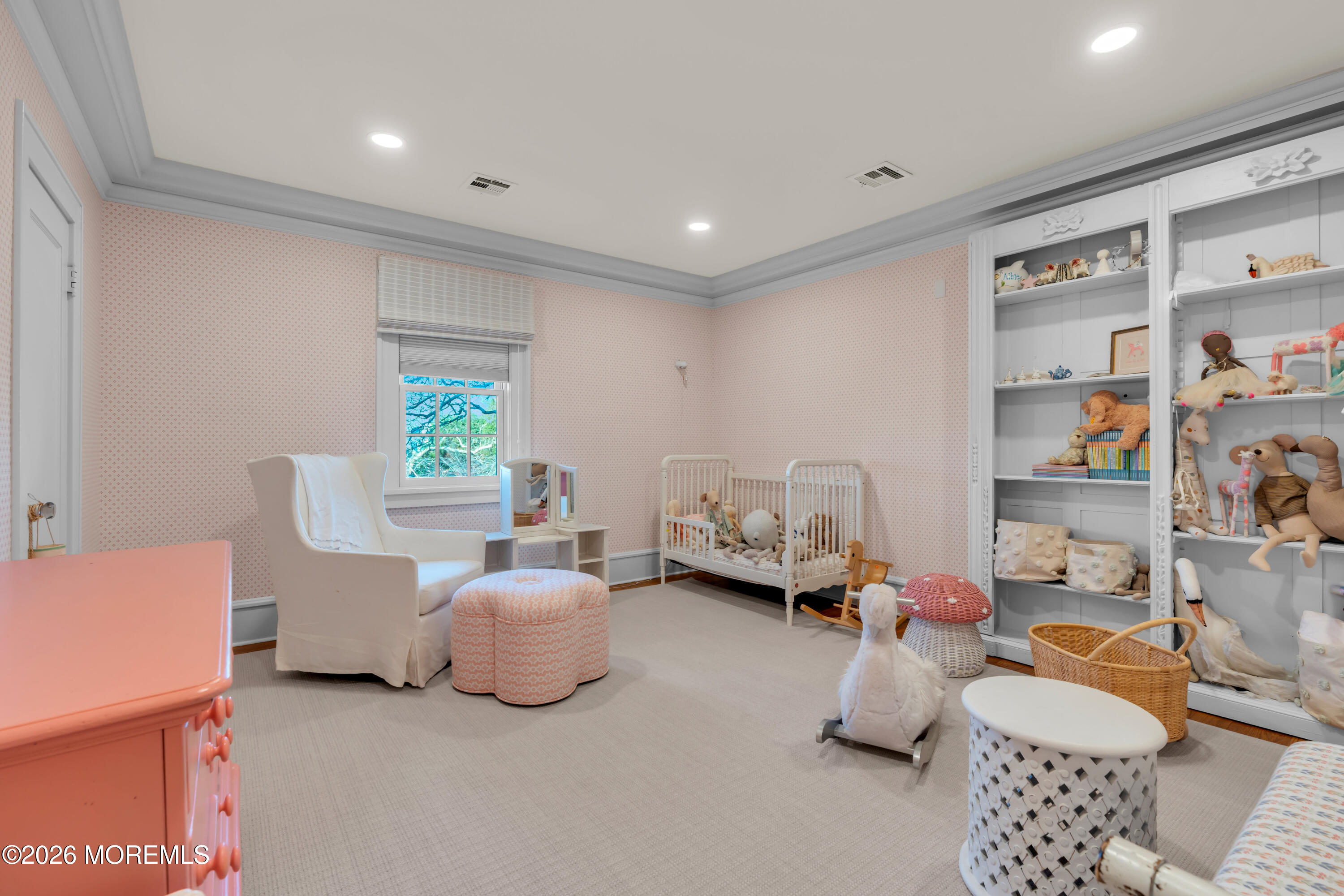 117 Madison Avenue Spring Lake, NJ 07762 - Photo 59 of 96 a living room with furniture and a book shelf