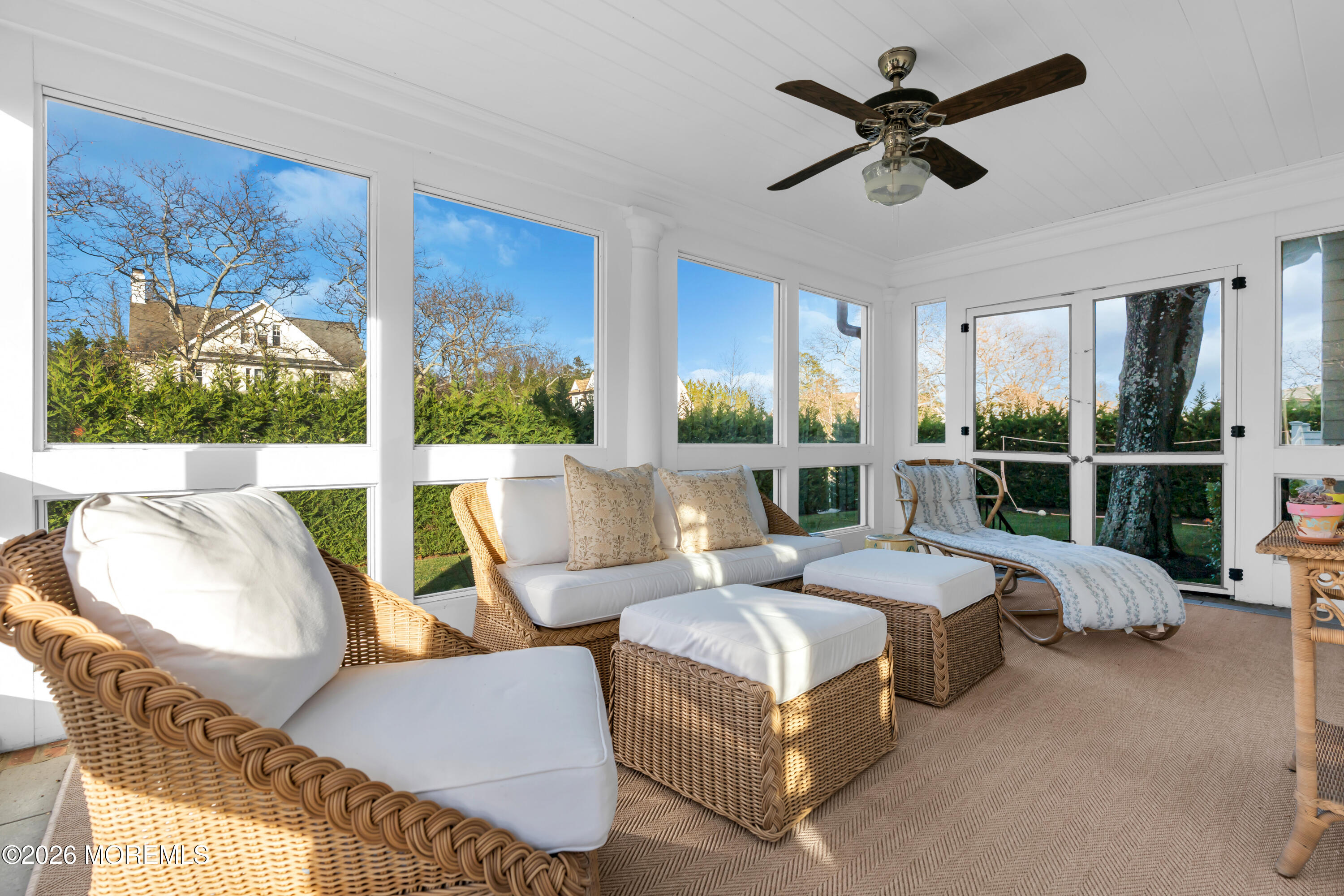 117 Madison Avenue Spring Lake, NJ 07762 - Photo 73 of 96 a living room with furniture and a floor to ceiling window
