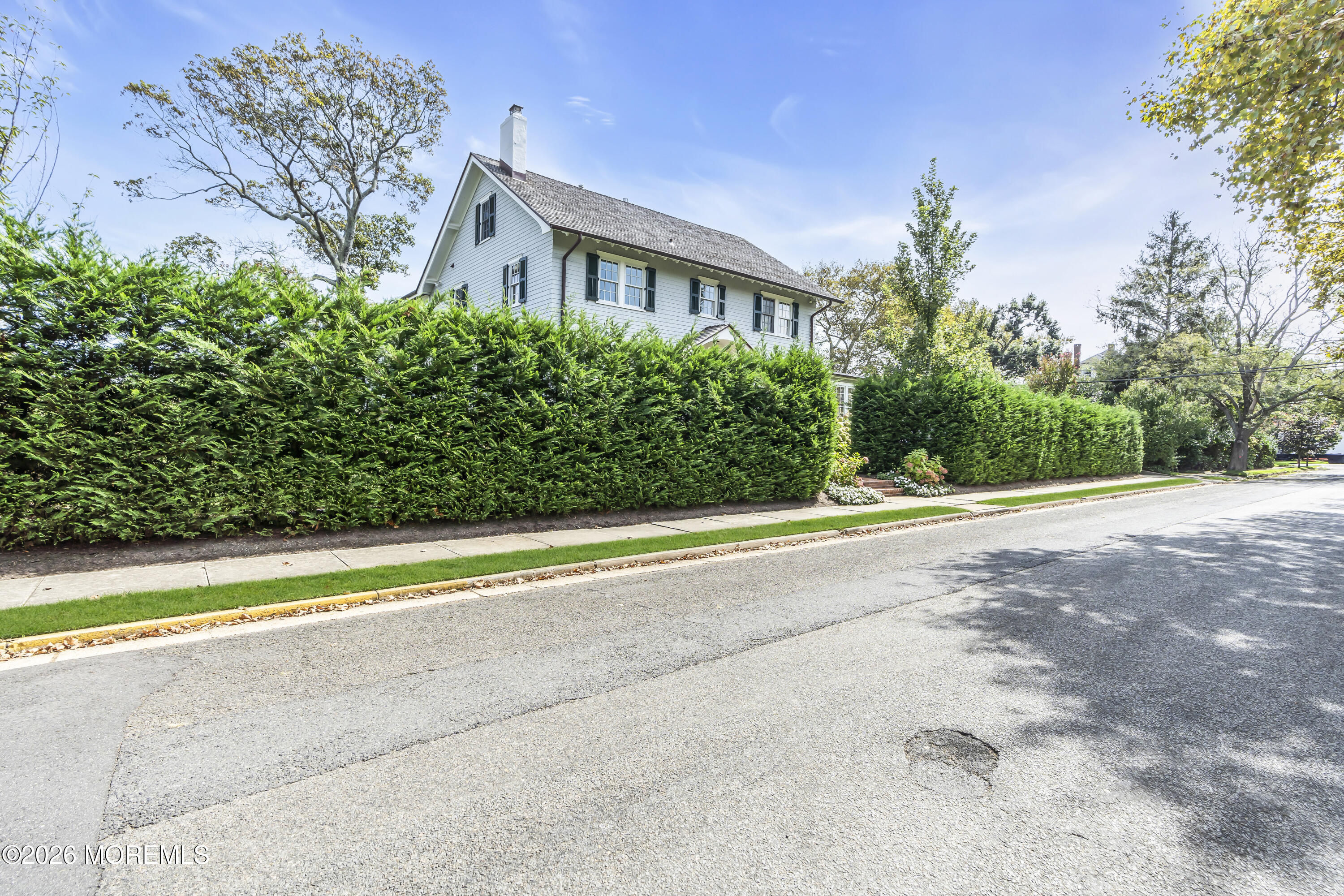 117 Madison Avenue Spring Lake, NJ 07762 - Photo 75 of 96 a view of a house with a yard and basketball court