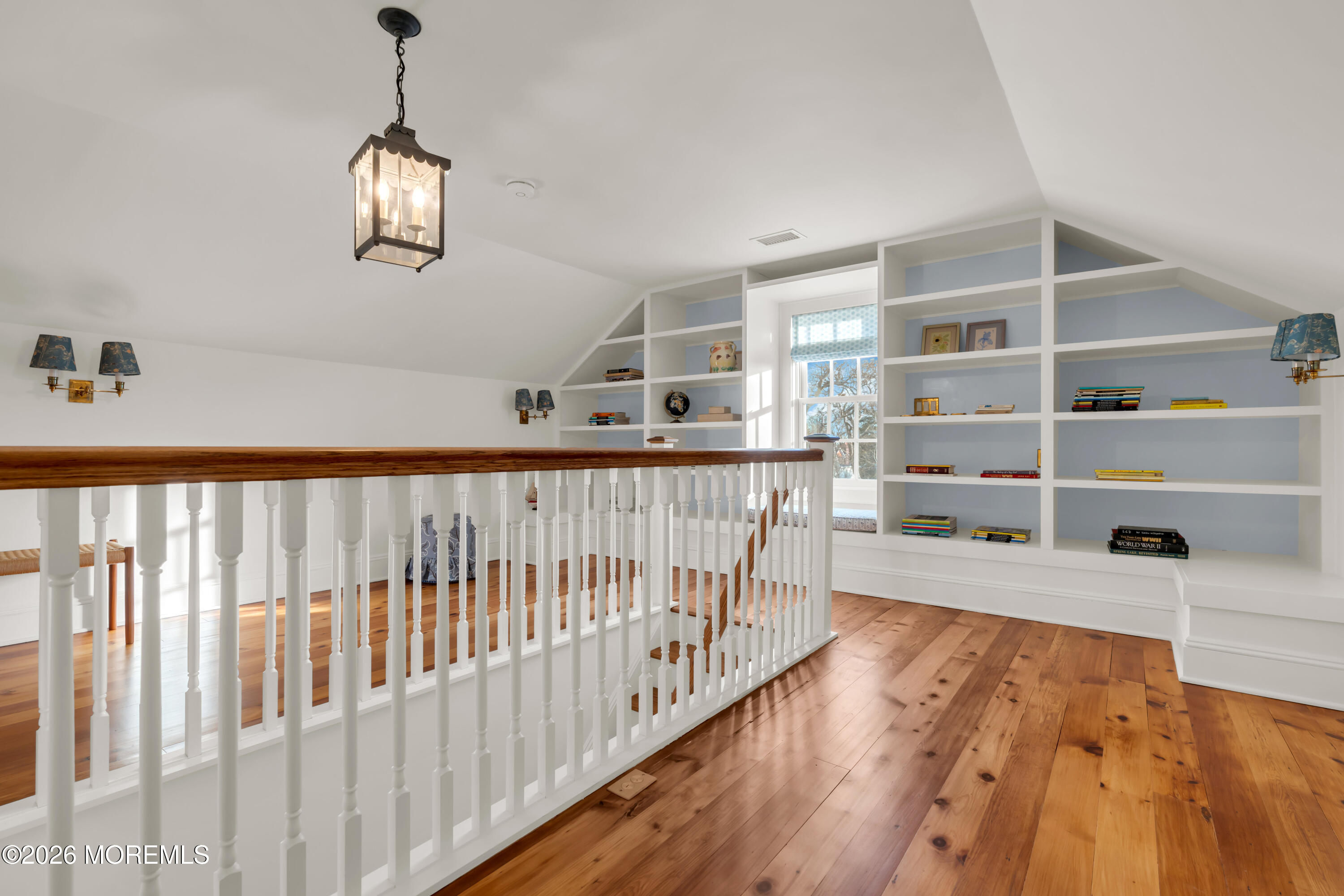 117 Madison Avenue Spring Lake, NJ 07762 - Photo 95 of 96 a view of a hallway with wooden floor and windows