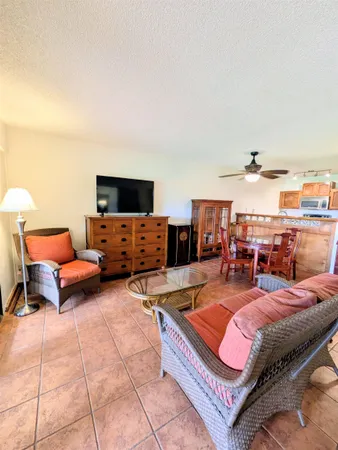 a outdoor space with furniture and flat screen tv