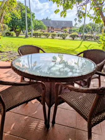 an aerial view of a swimming pool and a yard