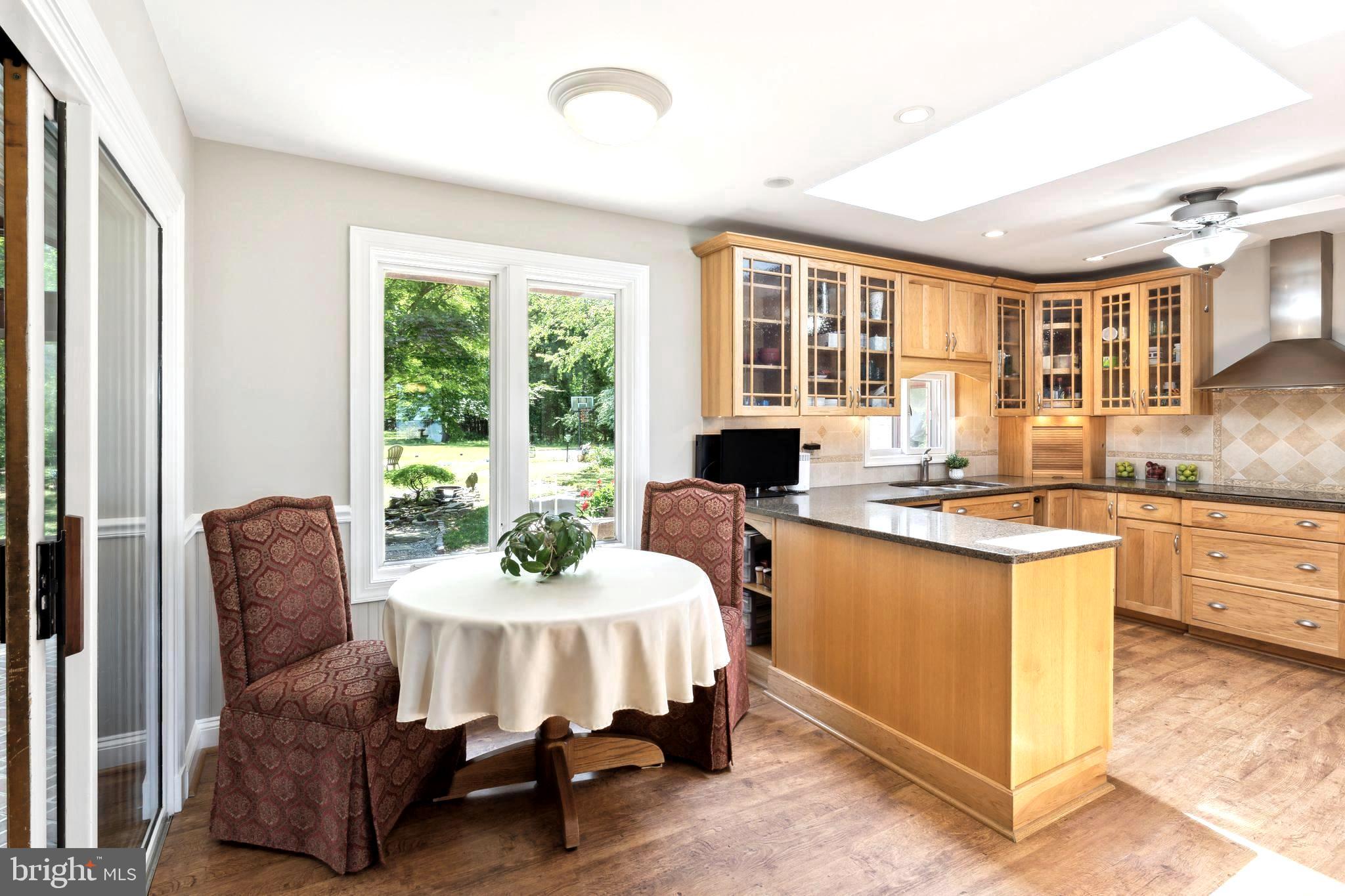 2034 Chesapeake Road Annapolis, MD 21409 - Photo 17 of 60 Breakfast room overlooks patio and pond