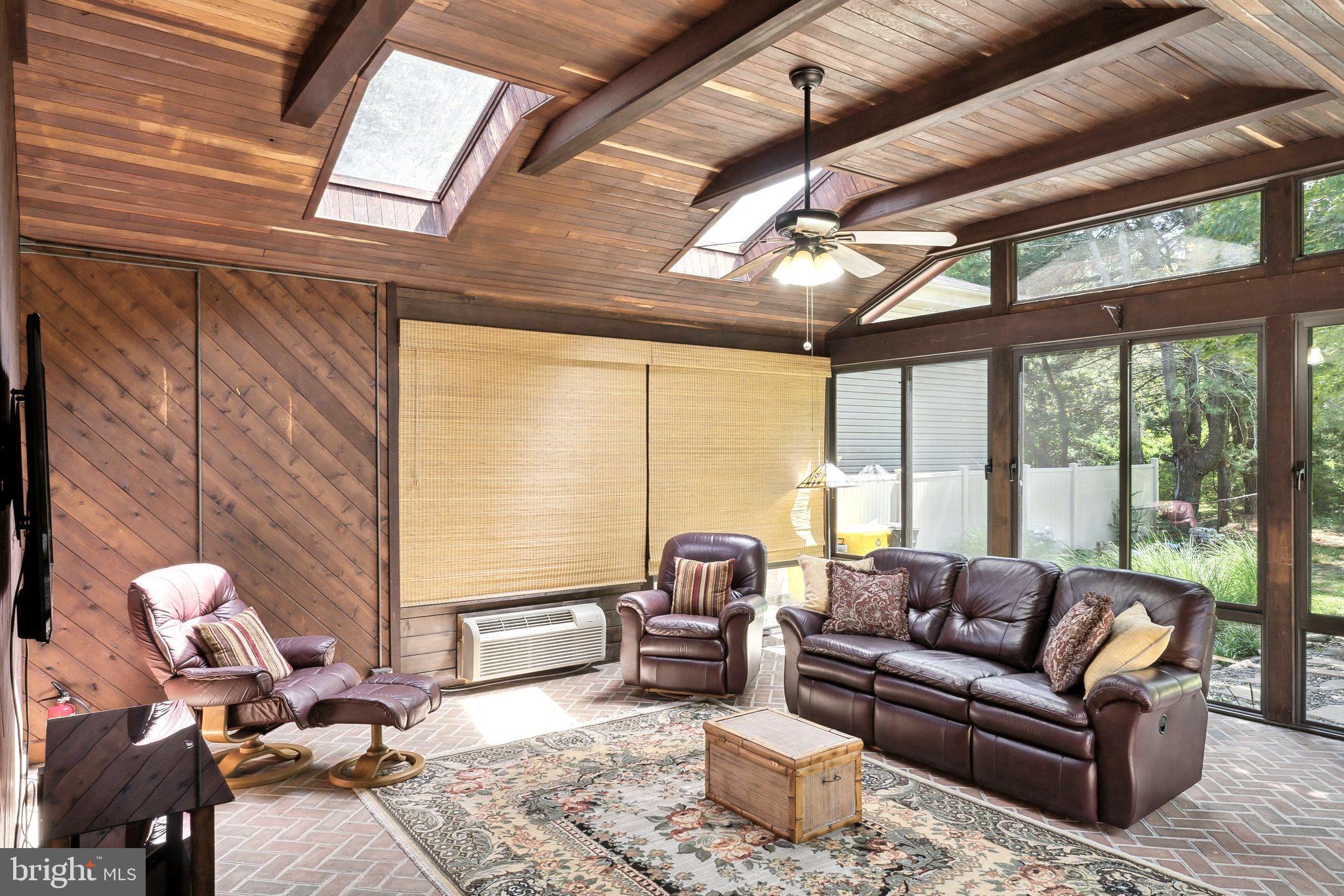 2034 Chesapeake Road Annapolis, MD 21409 - Photo 20 of 60 Main level familyroom overlooks patio and pond