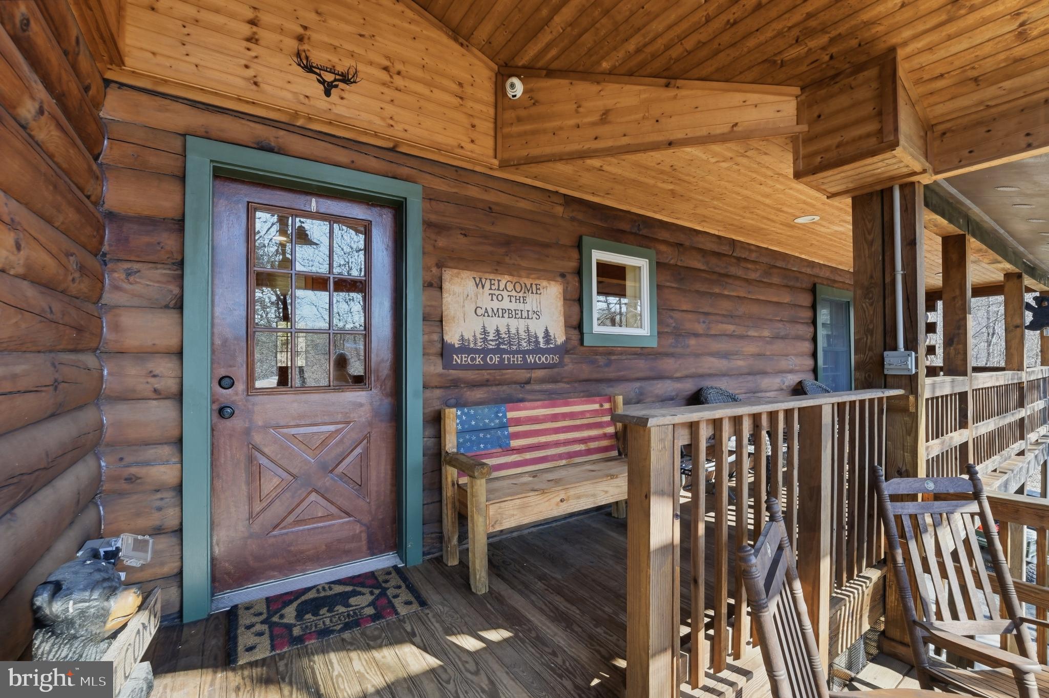 5276 Free State Road Marshall, VA 20115 - Photo 21 of 61 Charming log cabin entrance with rustic appeal.