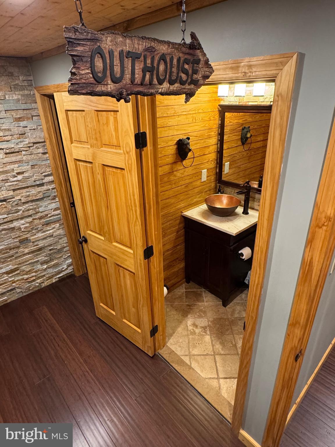 5276 Free State Road Marshall, VA 20115 - Photo 38 of 61 Charming rustic half bathroom with wooden accents.