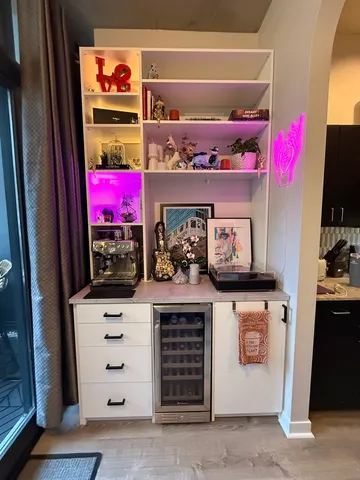 a kitchen with a stove and cabinets